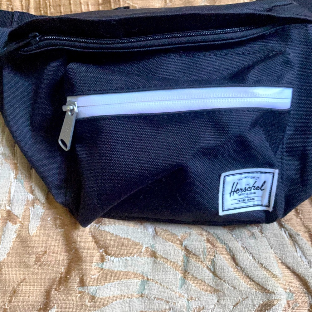 Black Herschel unisex pouch.